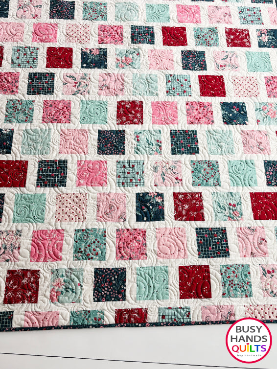 Handmade, heirloom-quality patchwork throw quilt in red, pink, teal, and creamy white. Perfect Christmas present for women and young ladies, or a birthday gift idea.