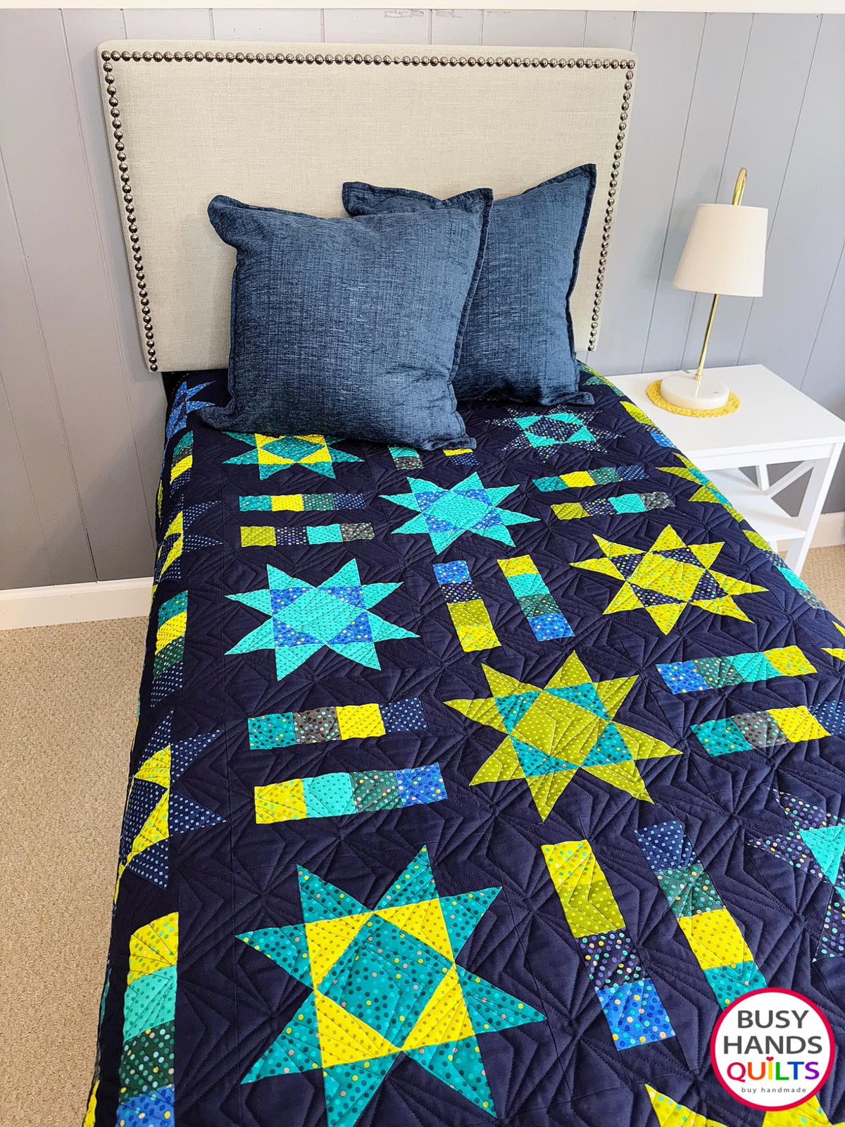 Handmade, heirloom-quality Throw Quilt with Stars and Stripes of Squares in blue, lime green, and aqua on a navy background. Perfect Christmas present idea, birthday gift idea with bright colors.