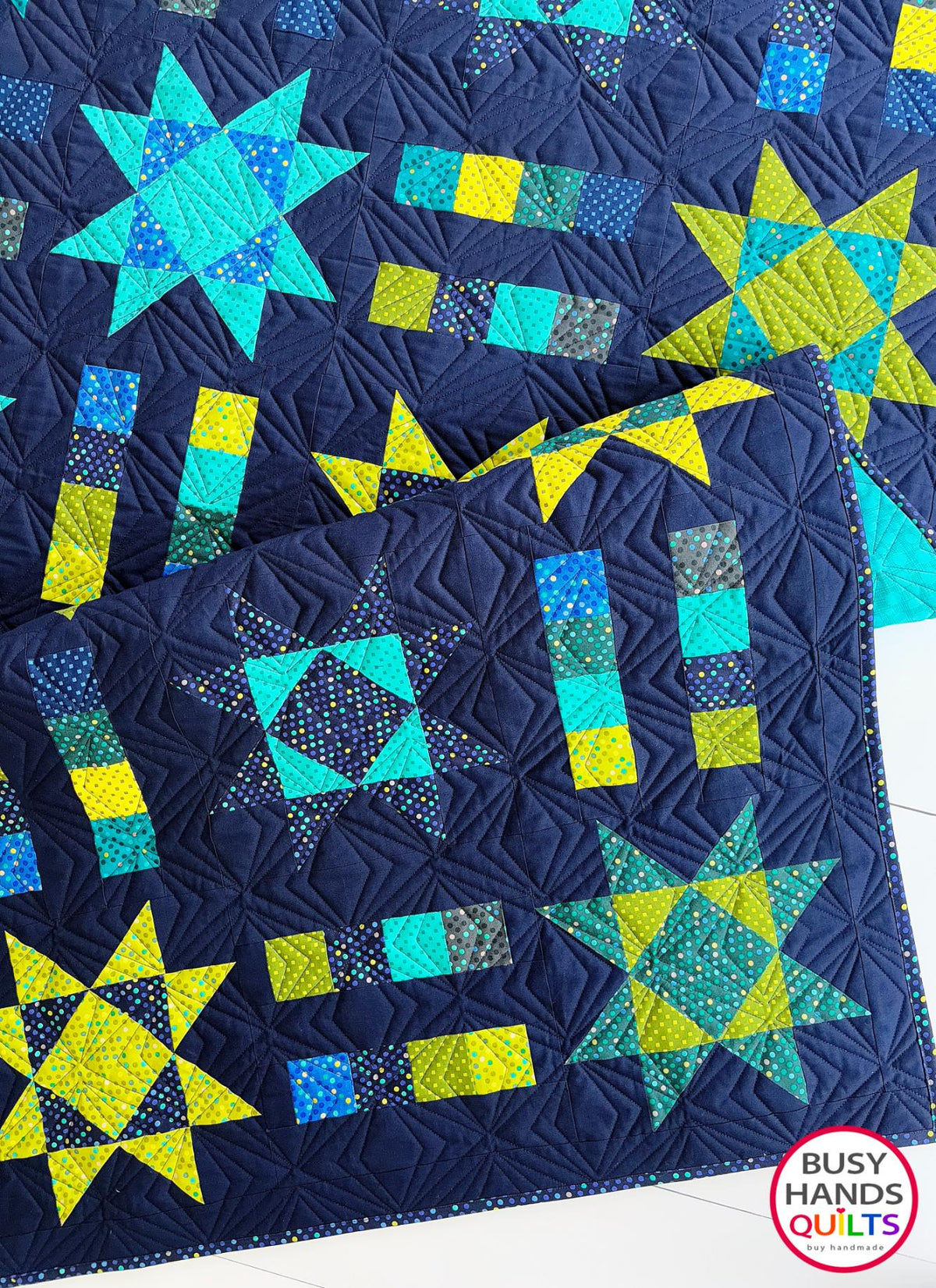 Handmade, heirloom-quality Throw Quilt with Stars and Stripes of Squares in blue, lime green, and aqua on a navy background. Perfect Christmas present idea, birthday gift idea with bright colors.