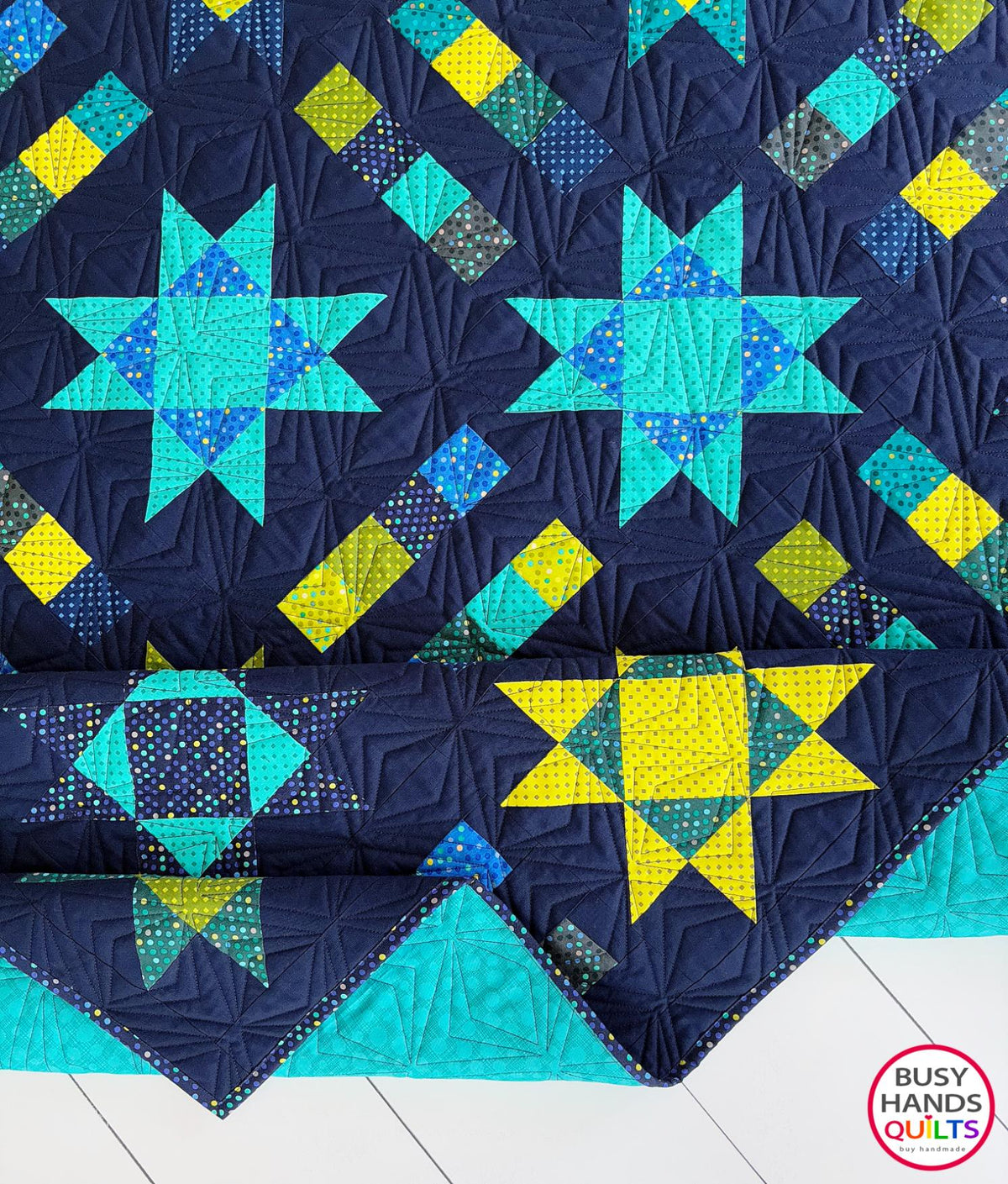 Handmade, heirloom-quality Throw Quilt with Stars and Stripes of Squares in blue, lime green, and aqua on a navy background. Perfect Christmas present idea, birthday gift idea with bright colors.