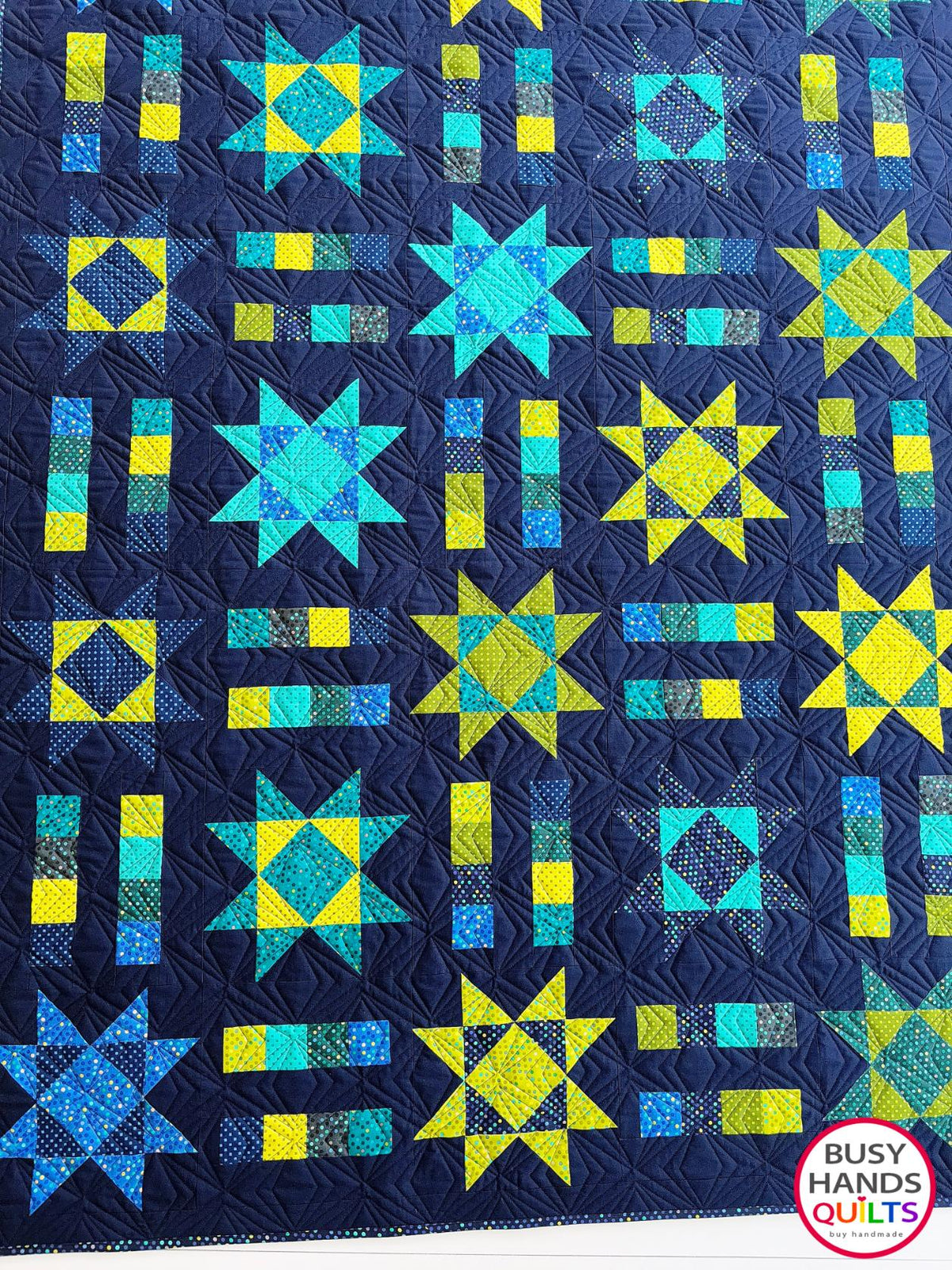 Handmade, heirloom-quality Throw Quilt with Stars and Stripes of Squares in blue, lime green, and aqua on a navy background. Perfect Christmas present idea, birthday gift idea with bright colors.