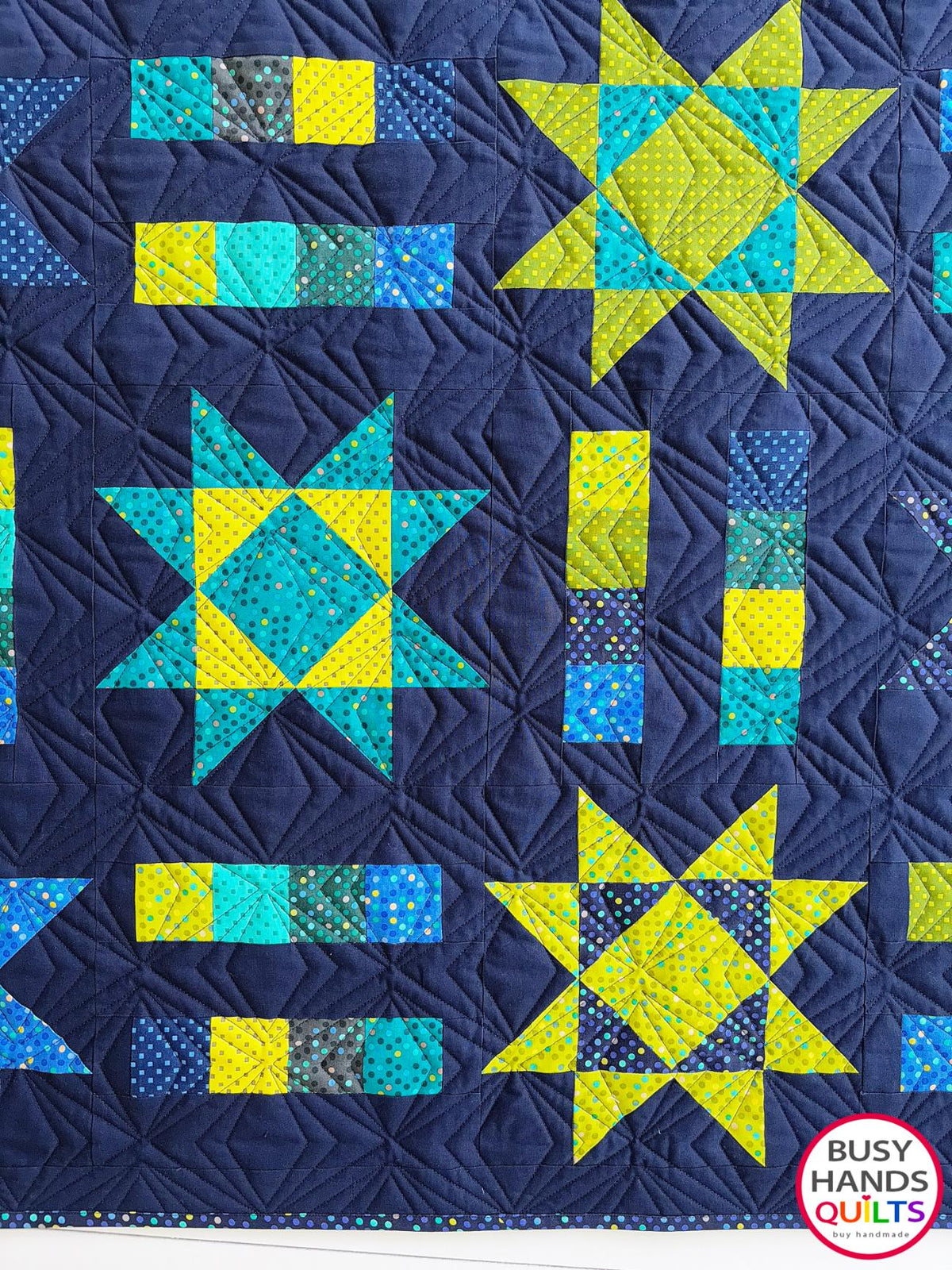Handmade, heirloom-quality Throw Quilt with Stars and Stripes of Squares in blue, lime green, and aqua on a navy background. Perfect Christmas present idea, birthday gift idea with bright colors.