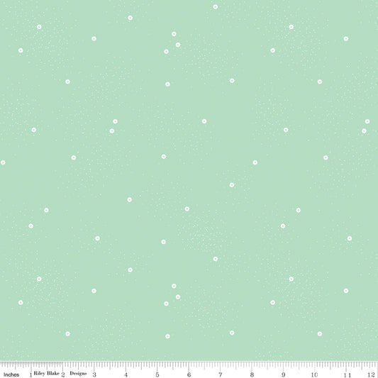Mint green wide backing quilt fabric with small white polka dots